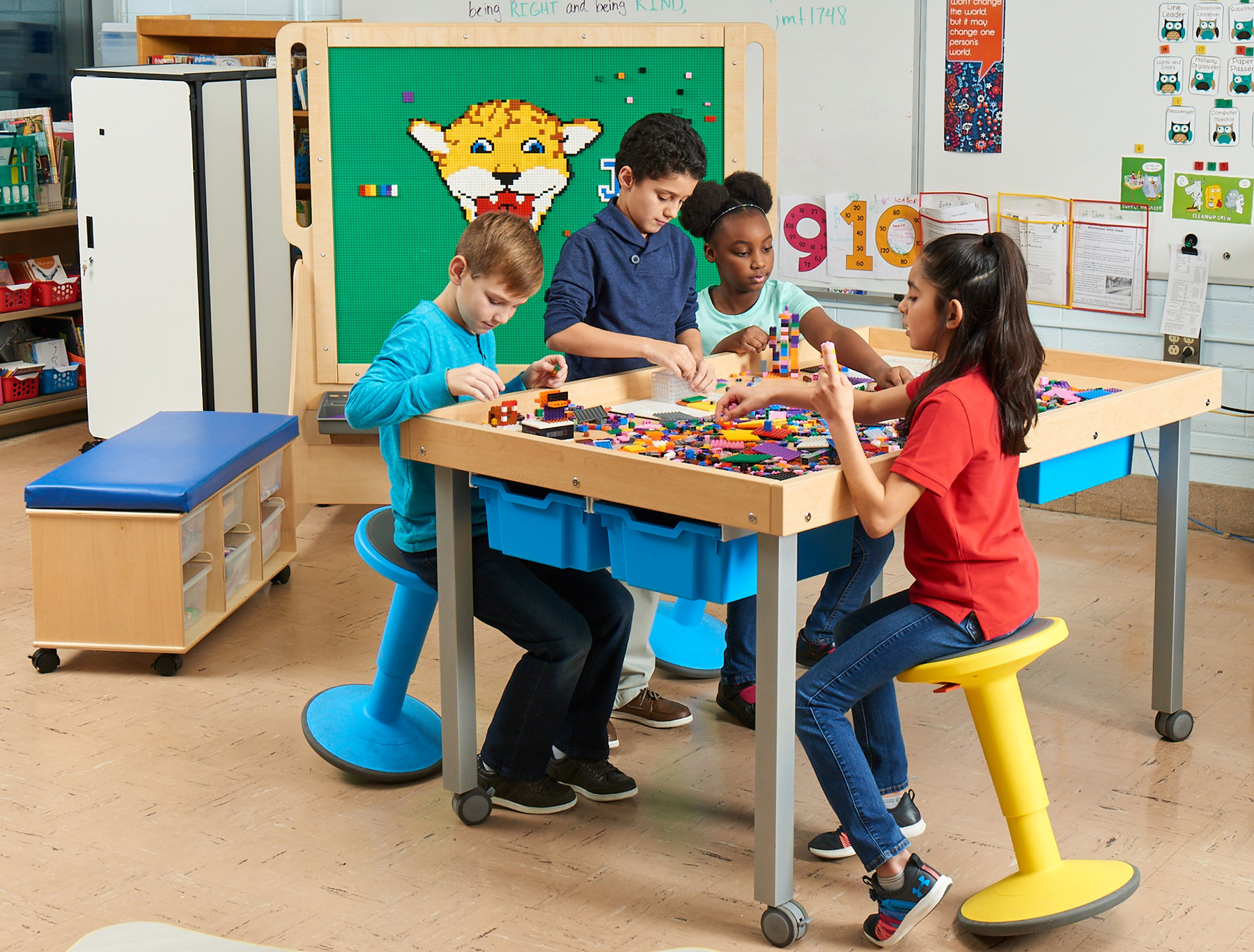 Kids working on Gear Guard Table